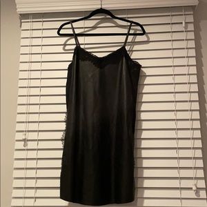 Black leather dress with lace finishings